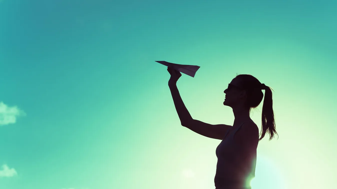 Woman throwing paper airplane Travel People Traveling Hand Raised Leisure Activity Women Incentive Inspiration Abstract Aiming Paper Airplane Color Image Craft 25-29 Years Day Dreaming Thinking Playing Playful Taking Off Throwing The Way Forward Caucasian