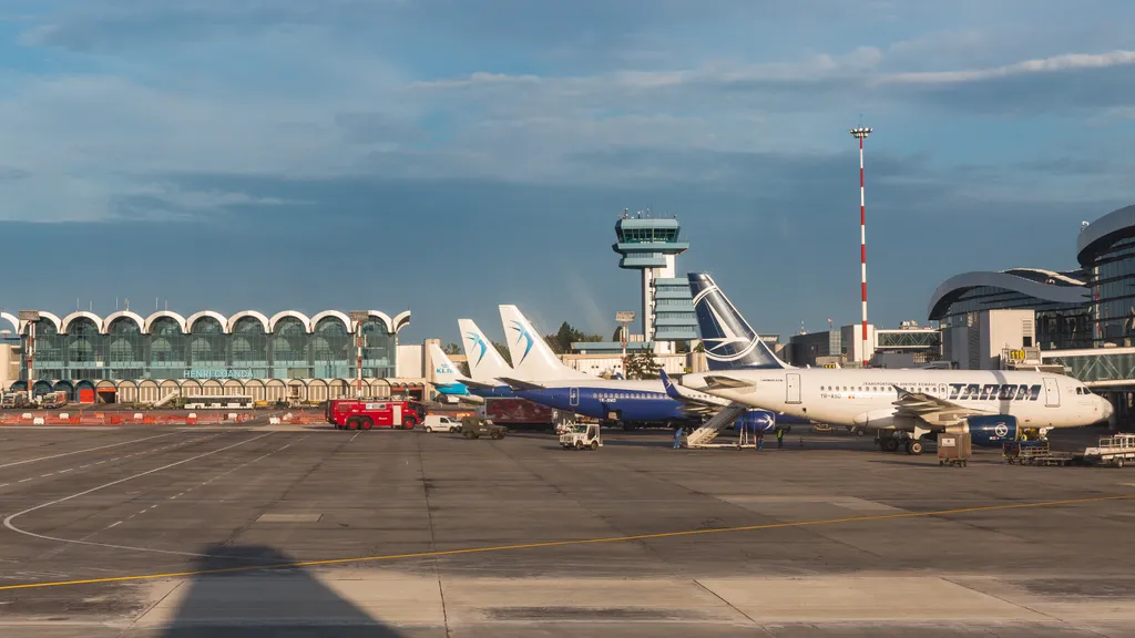 Bucharest, Romania, May 2018: Henri Coanda airport with several airplanes parked at the terminal legrosszabb repterek 