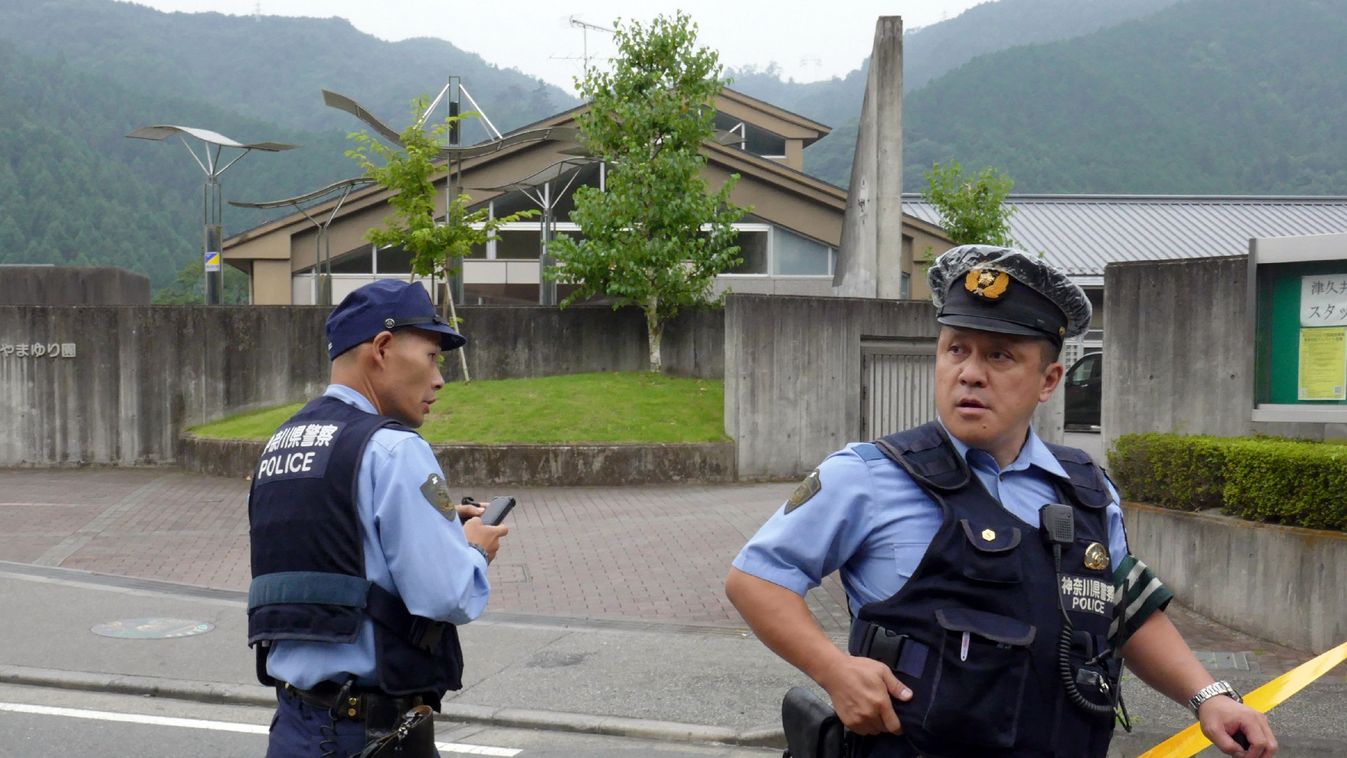 Horizontal Police officers stand guard outside the Tsukui Yamayuri En, a care centre where a knife-wielding man went on a rampage at Sagamihara city, Kanagawa prefecture on July 26, 2016.

At least 19 people were killed when a knife-wielding man went on a