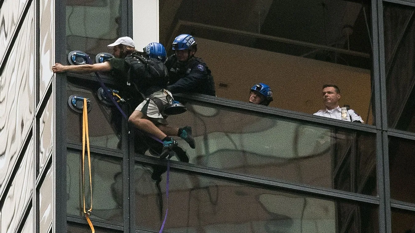 GettyImageRank2 Trump Tower Trump NEW YORK, NY - AUGUST 10: A man identified as 'Steve from Virginia' is grabbed by police as he climbs up the Trump Tower on August 10, 2016 in New York City. The man used suction cups to scale more than 20 stories of GOP 