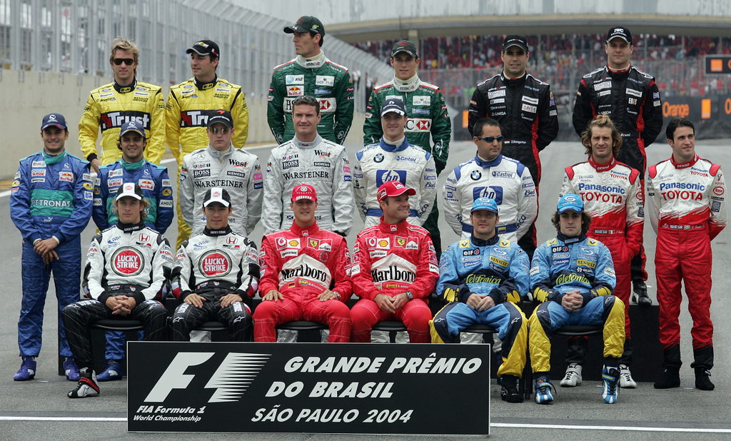 AUTO-F1-SAO PAULO-DRIVERS Timo Glock Gianmaria Bruni Horizontal CAR RACING F1 GRAND PRIX RACING DRIVER GROUP PICTURE LATIN AMERICA 