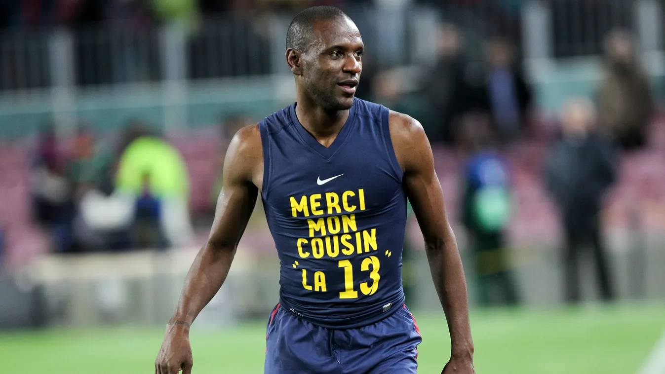 Eric Abidal wears a shirt reading "Thanks my cousin the 13" at the end of the Spanish league football match FC Barcelona vs  RCD Mallorca at the Camp Nou stadium in Barcelona on April 6, 2013. 