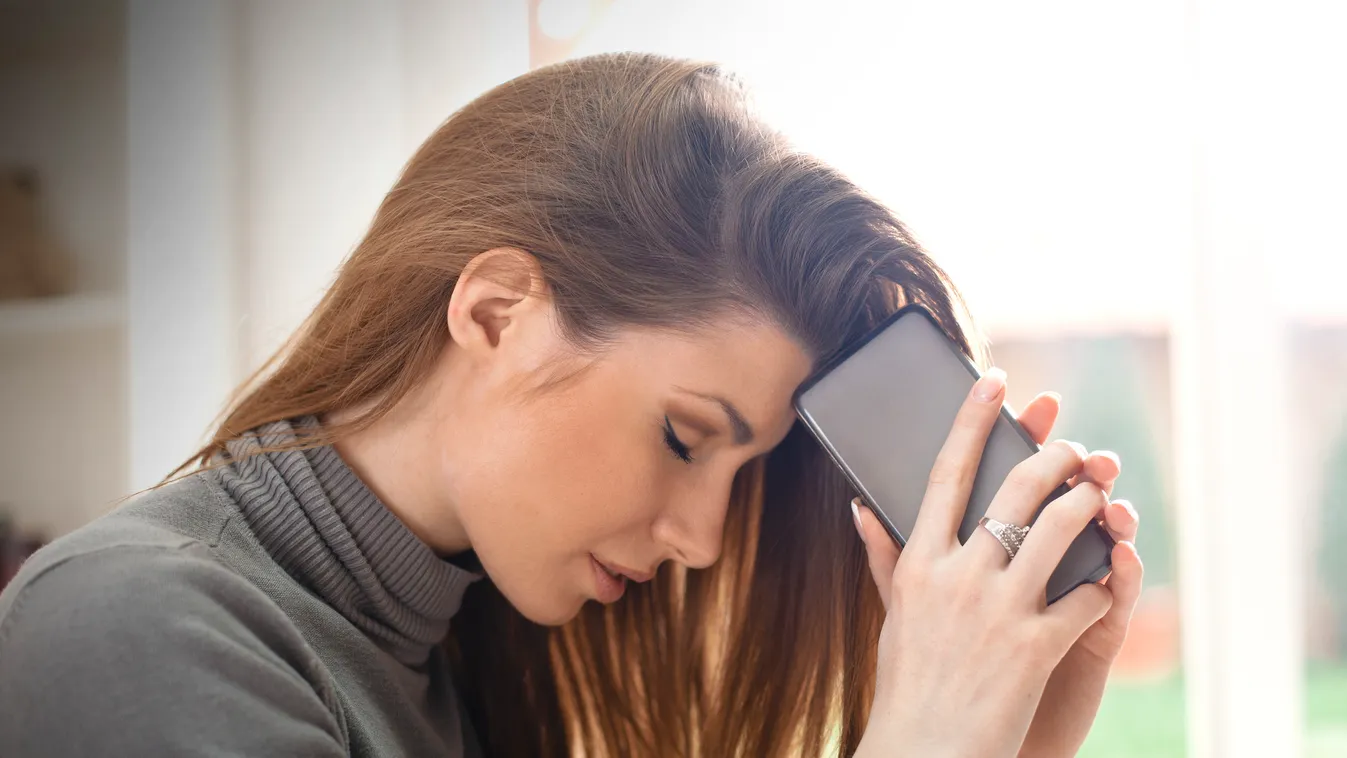 Unhappy girl with mobile phone Smart Phone Beautiful Bad News Teasing Teenage Girls Women Females Comfortable Copy Space Cute Teenager Sitting Looking Holding Touching Disgust Beauty Mobility Problems Relaxation Emotional Stress Sadness Depression - Sadne