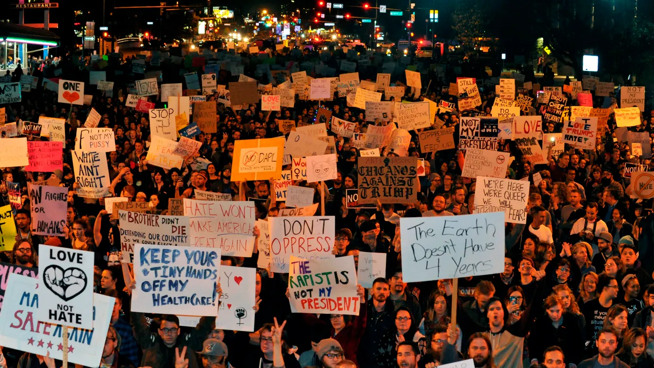 politics vote Horizontal Demonstrators protest the election of President elect Donald Trump in Denver, Colorado on November 10, 2016. / AFP PHOTO / Jason Connolly 