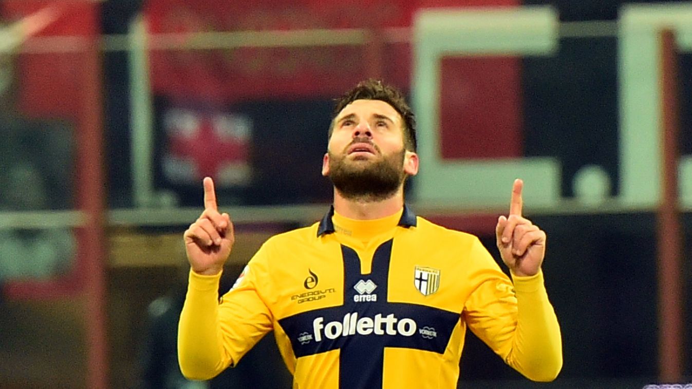 504225867 Parma's midfielder Antonio Nocerino celebrates after scoring during the Italian Serie A football match between AC Milan and Parma at San Siro Stadium in Milan on February 1, 2015. AFP PHOTO / GIUSEPPE CACACE 