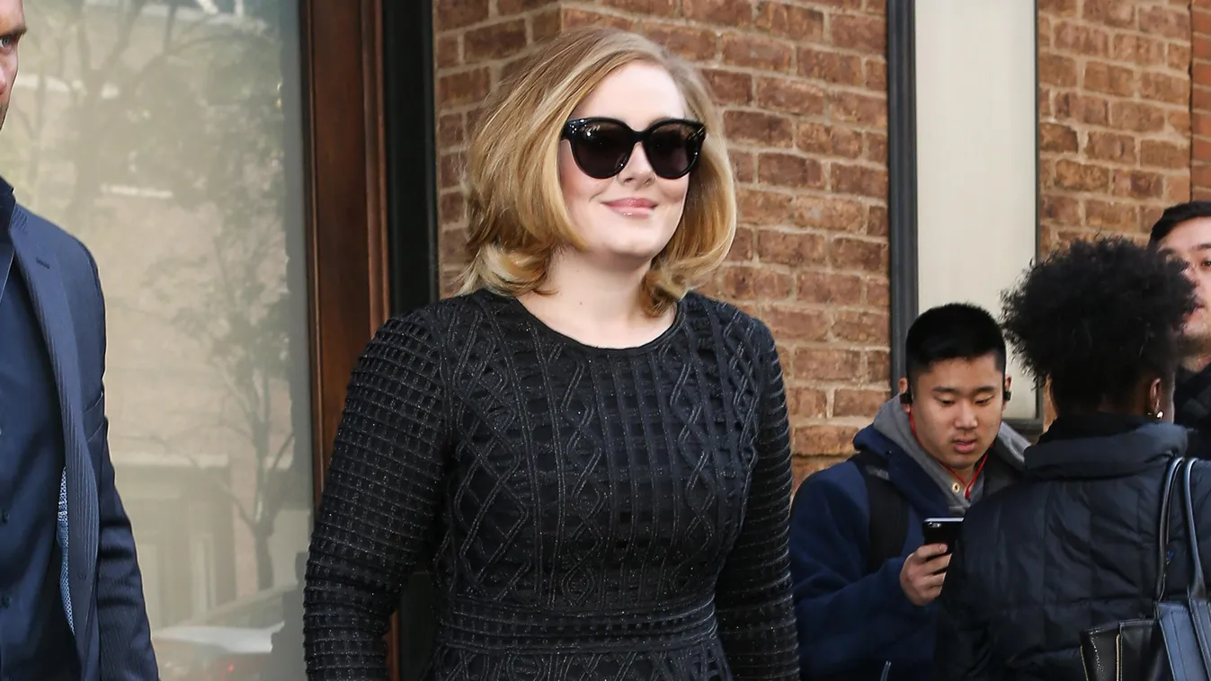 Adele is looking glamorous in all black greeting her adoring fans in New York PAPARAZZI 