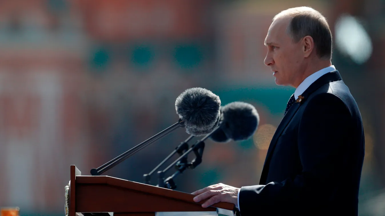 Russian President Vladimir Putin delivers a speech during the Victory Day military parade at Moscow's Red Square on May 9, 2015. Russian President Vladimir Putin presides over a huge Victory Day parade celebrating the 70th anniversary of the Soviet win ov