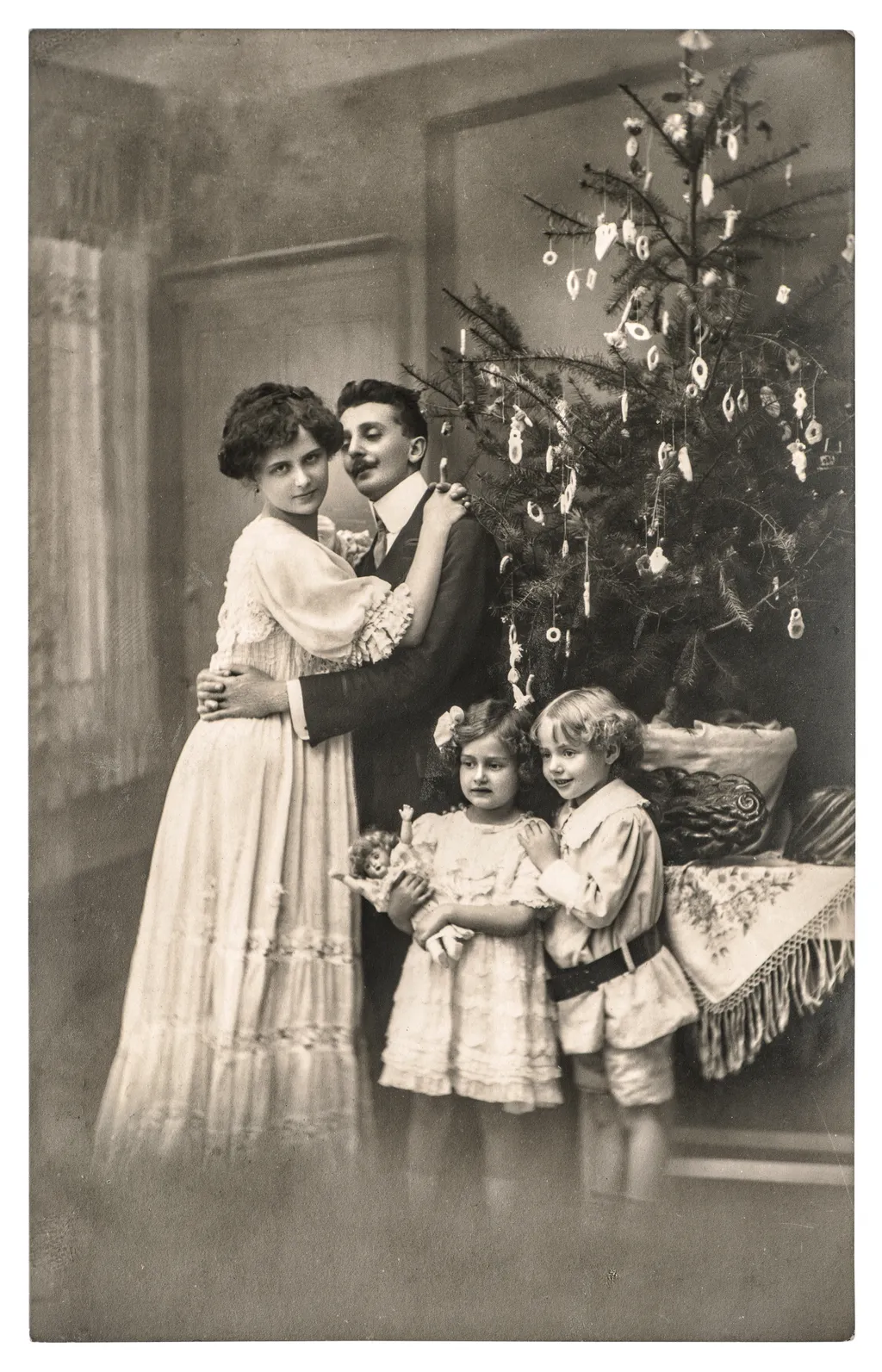 Victorian,Family,Parents,And,Children,With,Christmas,Tree,.,Vintage private,memory,woman,young,father,mummy,cute,scrapbook,sentiment 