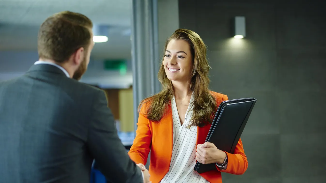 confident young job applicant White Collar Worker Businesswoman Businessman Women Females Males Two People Business Relationship Job Search Incentive Resume Job Interview Recruitment Dangling a Carrot Congratulating 30-39 Years 20-29 Years Young Adult Smi