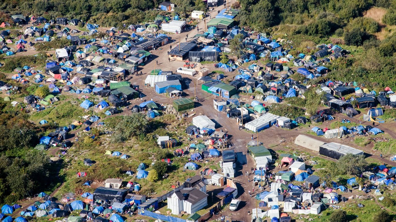 - HORIZONTAL AERIAL VIEW MAKESHIFT SHELTER CAMP WASTE GROUND TENT MIGRATION AND IMMIGRATION IMMIGRATION 