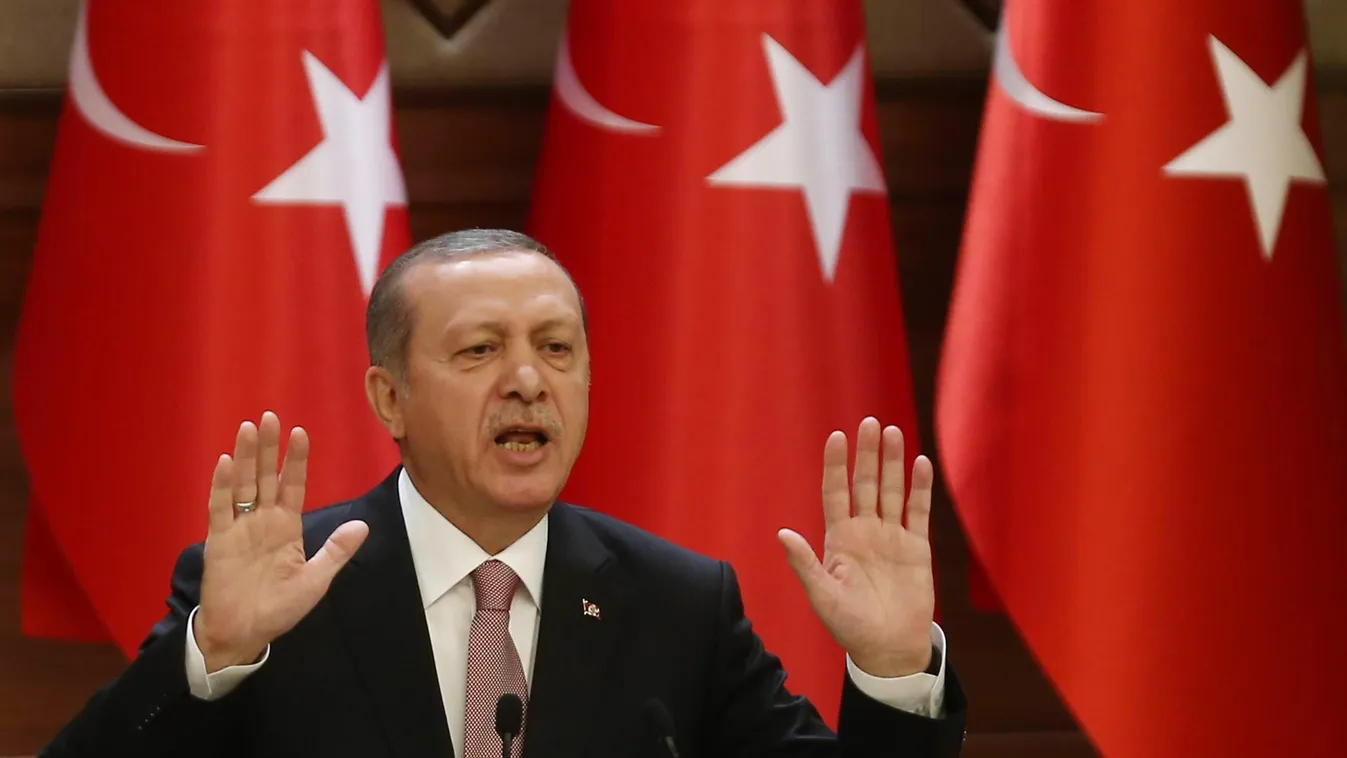 Turkish President Recep Tayyip Erdogan delivers a speech during a mukhtars meeting at the presidential palace on November 26, 2015 in Ankara. President Recep Tayyip Erdogan on November 26 said Turkey does not buy any oil from Islamic State, insisting that