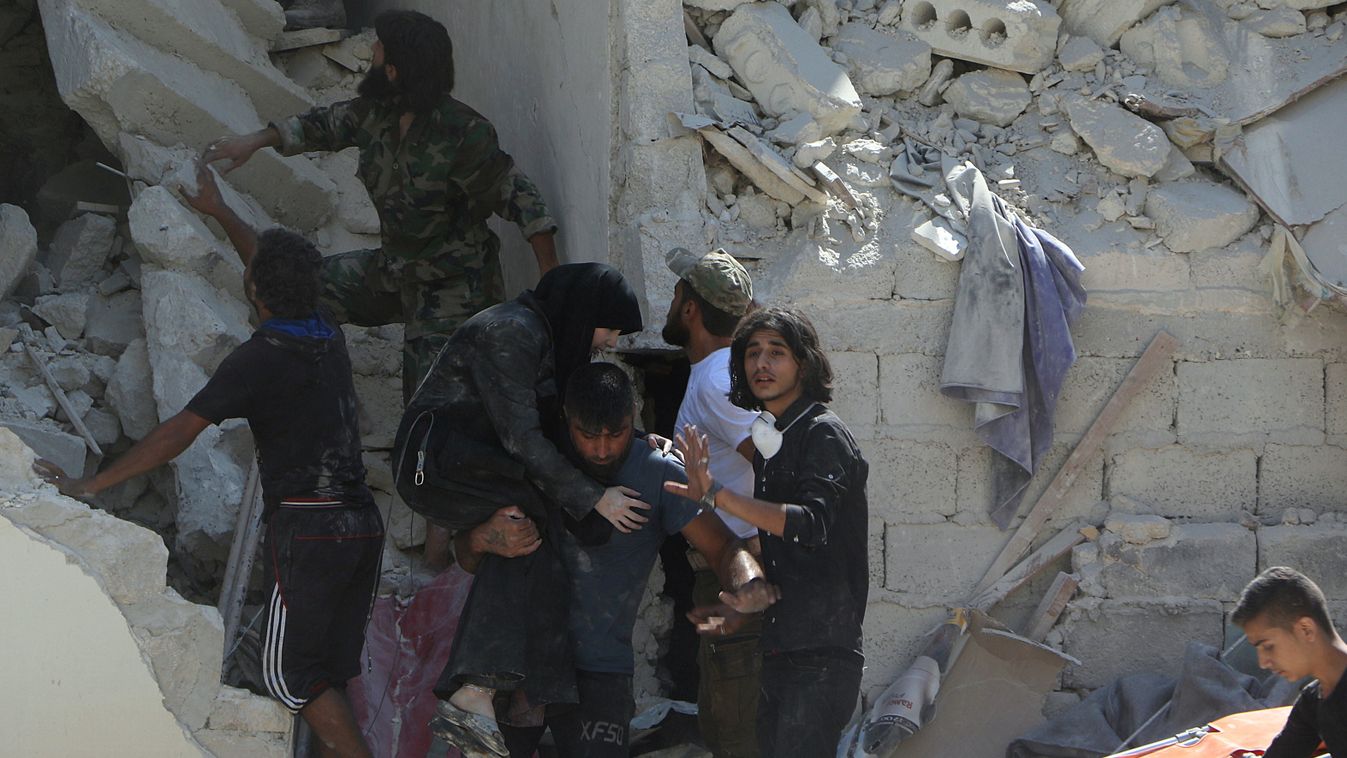 Syrian civil war airstrikes Syria Aleppo 2016 Syrian army September warcrafts debris of a building People inspect Salihiya 