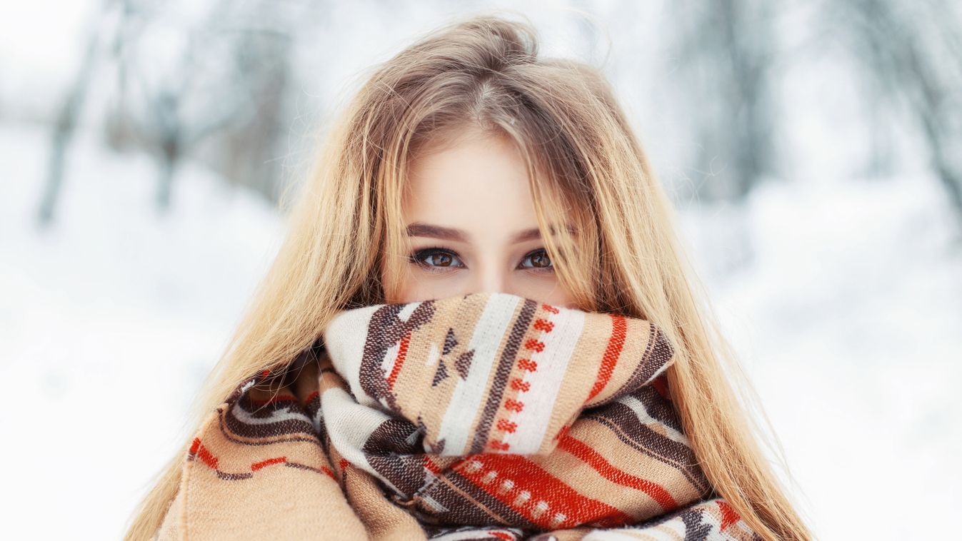 Young happy woman wearing winter cloth. Scarf on the face Beautiful Retro Styled Fashion Portrait Girls Women Females Collection Fashion Model Bundle Scarf Checked Pattern Cute Young Adult Hiding Walking Moving Up Beauty Caucasian Ethnicity One Person Col