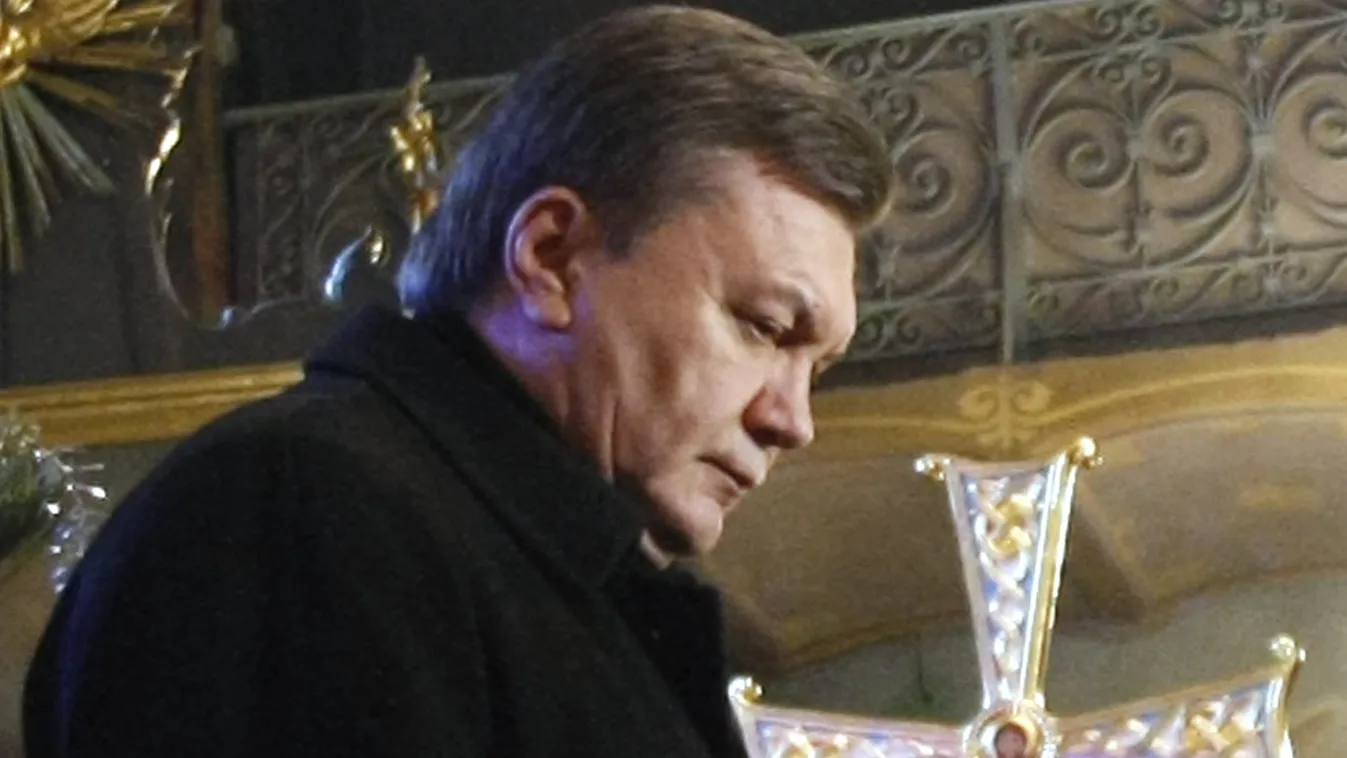 VERTICAL Ukrainian opposition leader and the presidential candidate Viktor Yanukovich attends a service in the Kiev-Pechersk Lavra church in Kiev on January 16, 2010, prior to the presidential election in Ukraine on January 17. Pro-Russia politician Vikto
