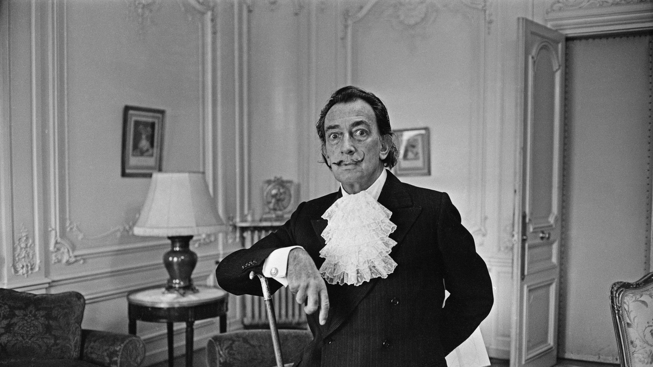 Salvador Dali black & white photograph Huty19658 Huty 19658 1964 EXP 1964 8451 FR 20a one man only eye contact posed half length indoors cravat cane moustache 