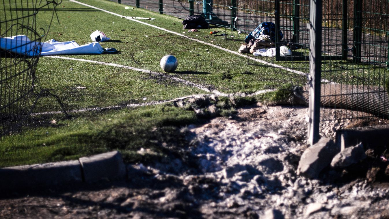 A picture shows a ball at a school sports ground on November 6, 2014, where two teenagers were killed during a shelling in the Kuybeshevski area in Donetsk. Ukraine's tattered ceasefire came under new strain on November 5, as shelling killed two teenagers