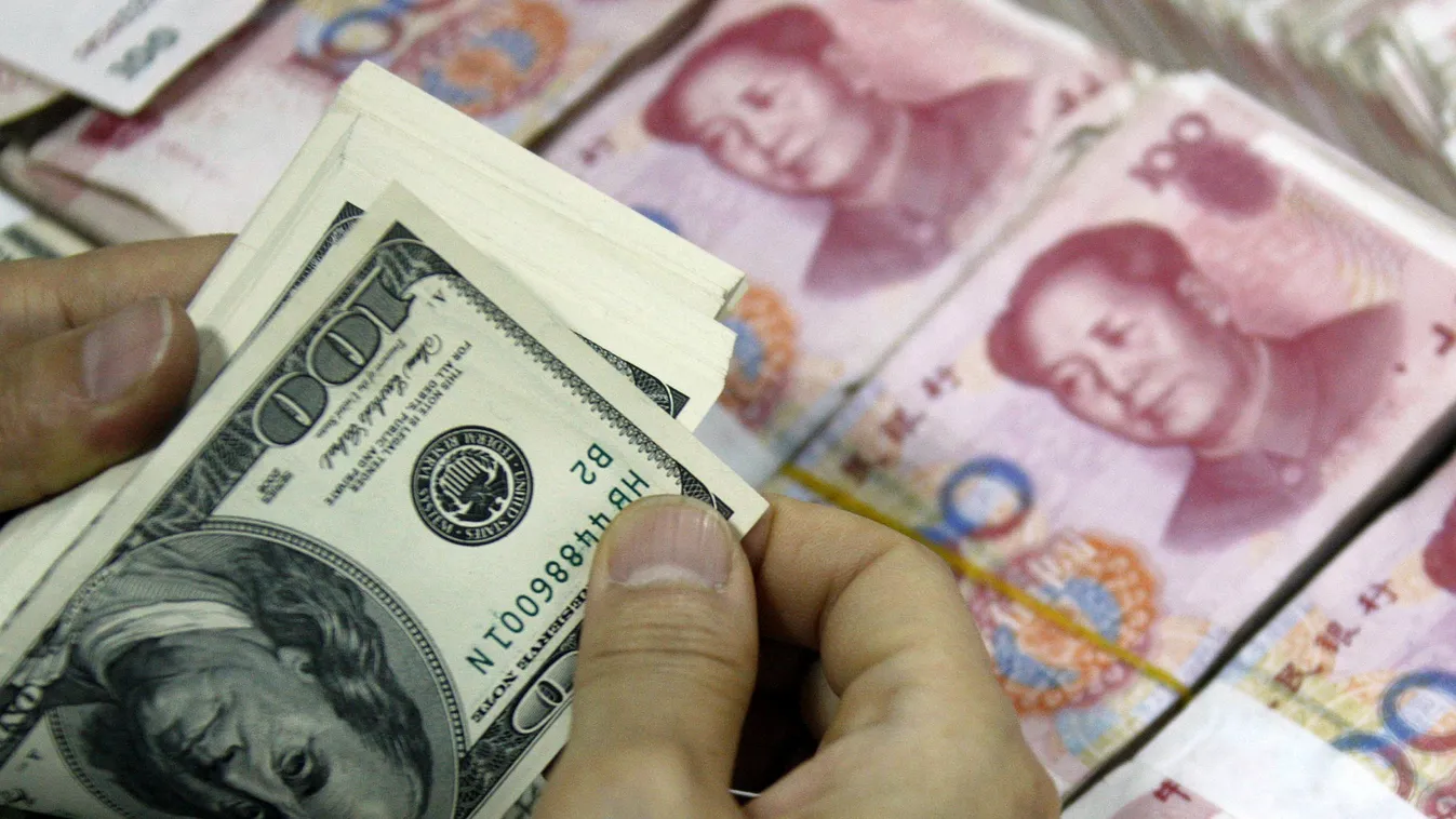 jüan yuan dollár USD 