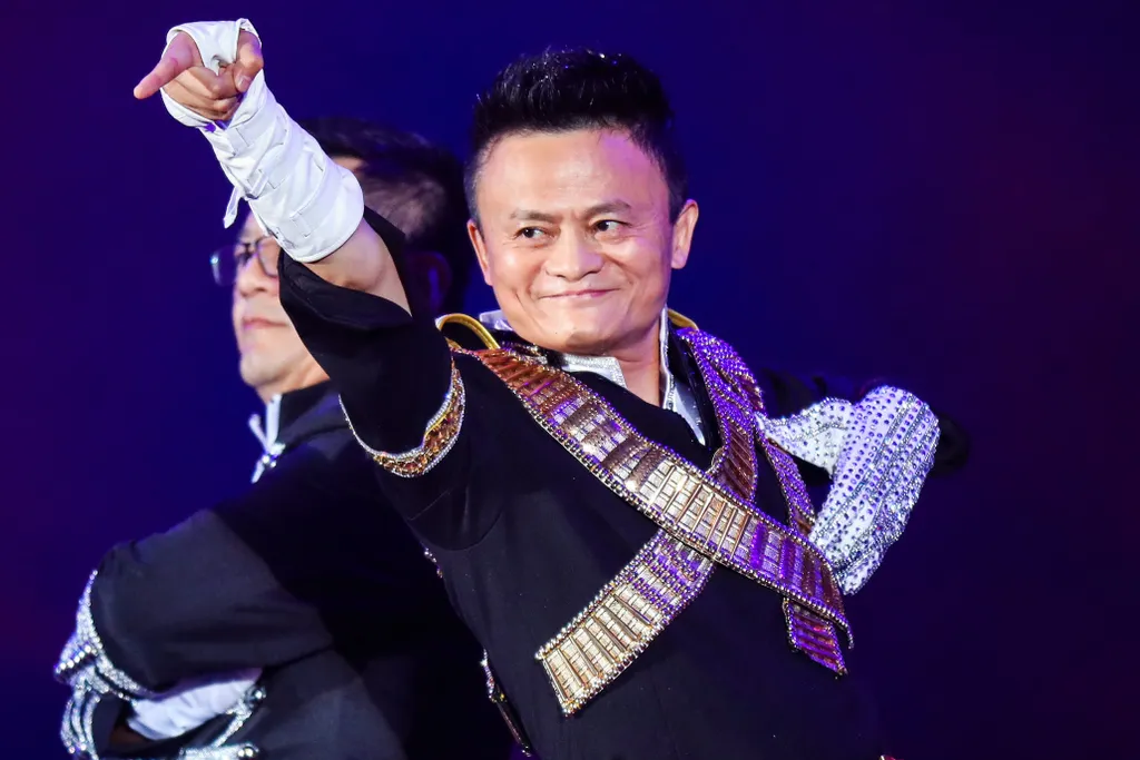Horizontal (FILES) This file photo taken on September 8, 2017 shows Jack Ma, chairman of Alibaba group, dancing to a medley of Michael Jackson songs during the Alibaba Annual Party at the Huanglong sports center in Hangzhou in China's eastern Zhejiang pro