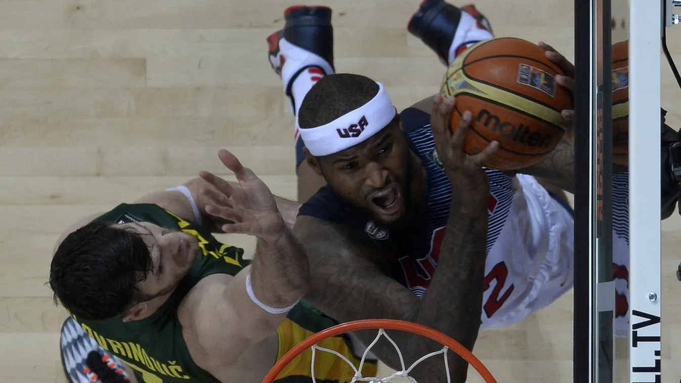 509809031 US centre DeMarcus Cousins (R) vies with Lithuania's centre Darjus Lavrinovic (L) during the 2014 FIBA World basketball championships semifinal match Lithuania vs USA at the Palau Sant Jordi in Barcelona on September 11, 2014. USA won 96-68.   A