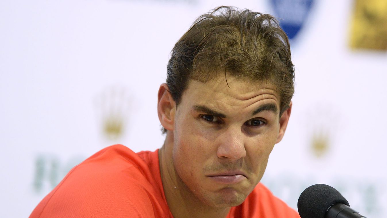 Rafael Nadal of Spain attends a press conference after losing against Feliciano Lopez of Spain during their men's singles second round match at the Shanghai Masters 1000 tennis tournament held in the Qizhong Tennis Stadium in Shanghai on October 8, 2014. 