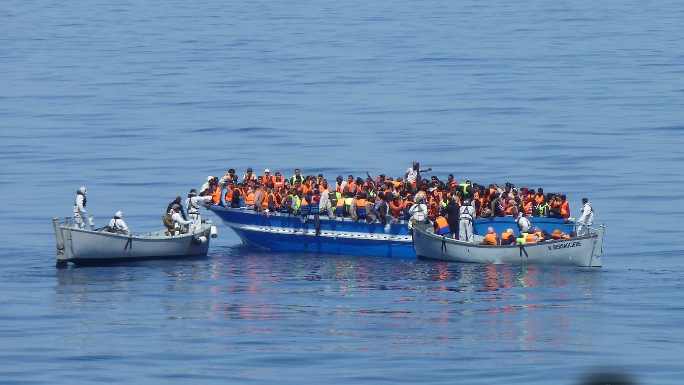 Olaszország, menekültválság, migráció, migráns, menekülttábor, Lampedusa Italy Mediterranean Sea rescue operation migrants Illegal migration Italian coast guard SQUARE FORMAT ITALY - SICILY - MAY 3: The Italian coast guard carry out search and rescue oper
