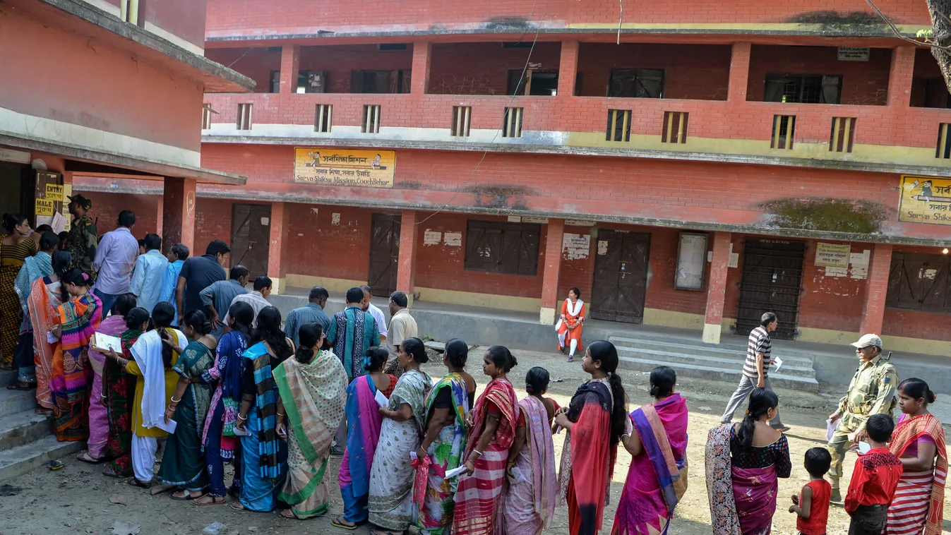 vote voting Horizontal People line up to vote at a polling station during India's general election in Cooch Behar, West Bengal on April 11, 2019. - India's mammoth six-week general election kicked off April 11, with polling stations in the country's north