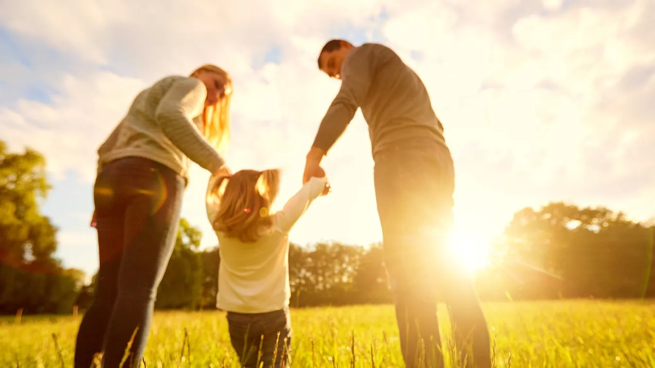 Out of focus backgrounds.Happy family concept. Two Parents Baby Girls Women Females Men Males Group Of People Parking Beauty In Nature Adoption Grass Dawn Cute Child Smiling Beauty Healthy Lifestyle Caucasian Ethnicity Togetherness Joy Happiness Love Conc
