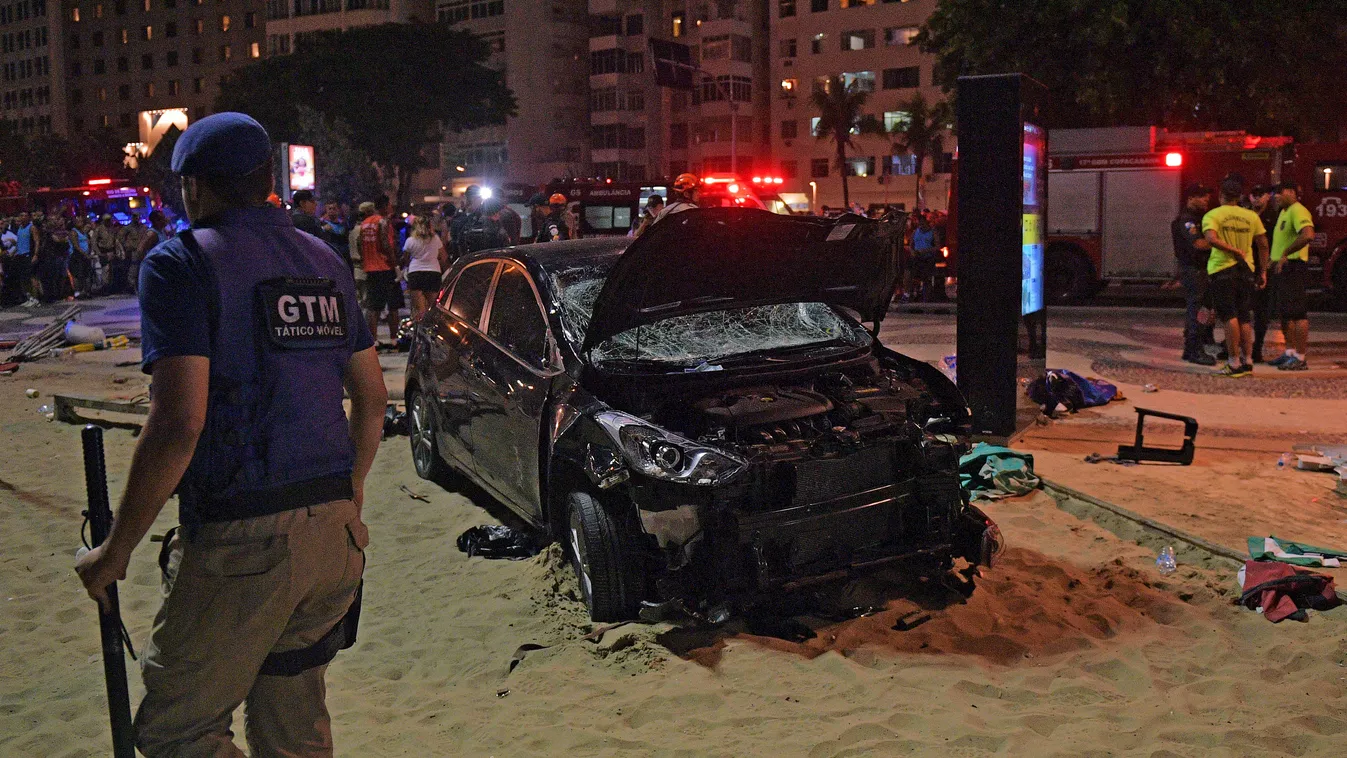 accident Horizontal The scene of a car crash pictured at Copacabana beach in Rio de Janeiro on January 18, 2018.
At least 11 people were injured by a car that drove up onto Copacabana's tourist-packed seafront promenade in the heart of Rio de Janeiro. / A