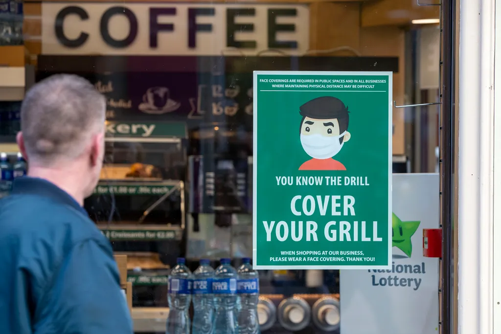 Ireland lockdown
 CORONAVIRUS COVID-19 An information poster advising the wearing of face coverings as a precaution against the spread of the novel coronavirus covid-19 is seen on the window of a coffee shop in Dublin on October 21, 2020 as Ireland prep 