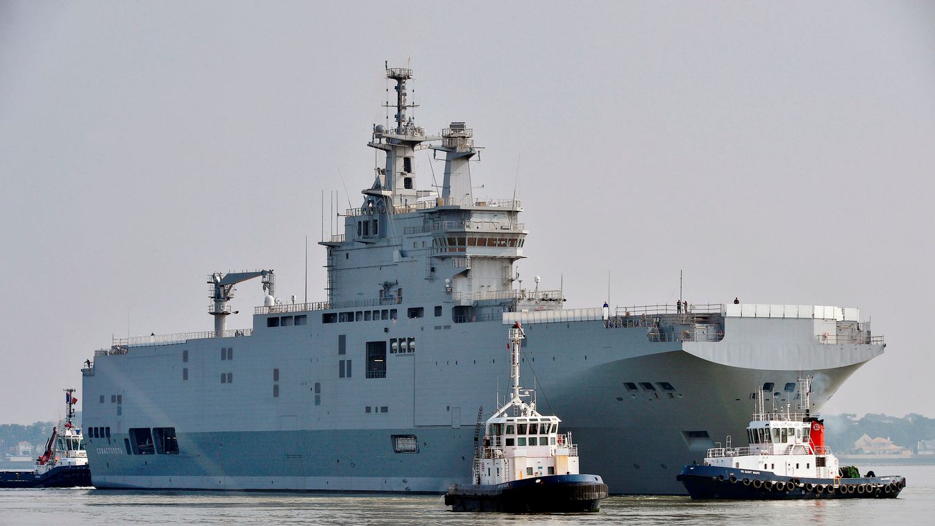 (FILES) A file photo taken on March 16, 2015 shows the Sevastopol mistral warship on its way for its first sea trials off the western French port of Saint-Nazaire. The Sevastopol made its second open-sea outing on April 14 and should return to port on Apr