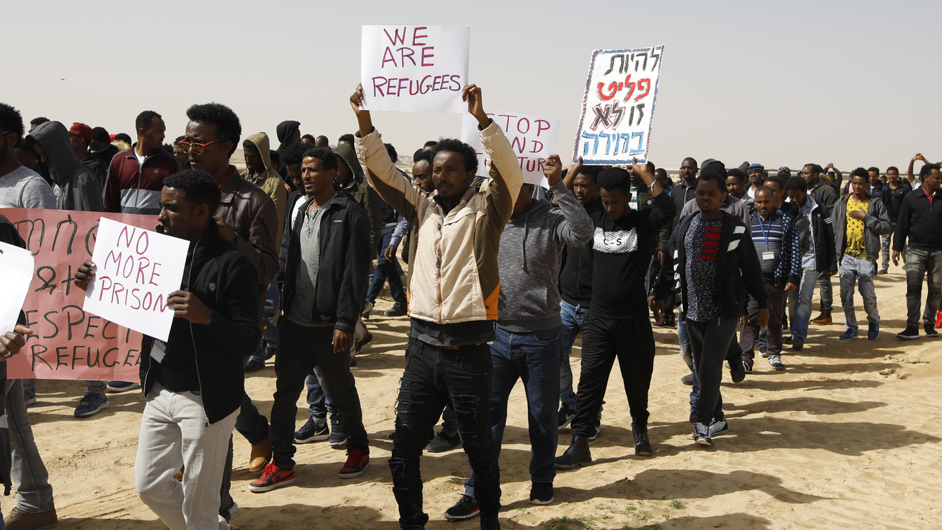 TOPSHOTS Horizontal MIDDLE EAST MIGRANT MIGRATION AND IMMIGRATION ILLEGAL IMMIGRANT AFRICAN RALLY DEMONSTRATION PLACARD CENTRE DE RETENTION ADMINISTRATIVE ASYLUM SEEKER 