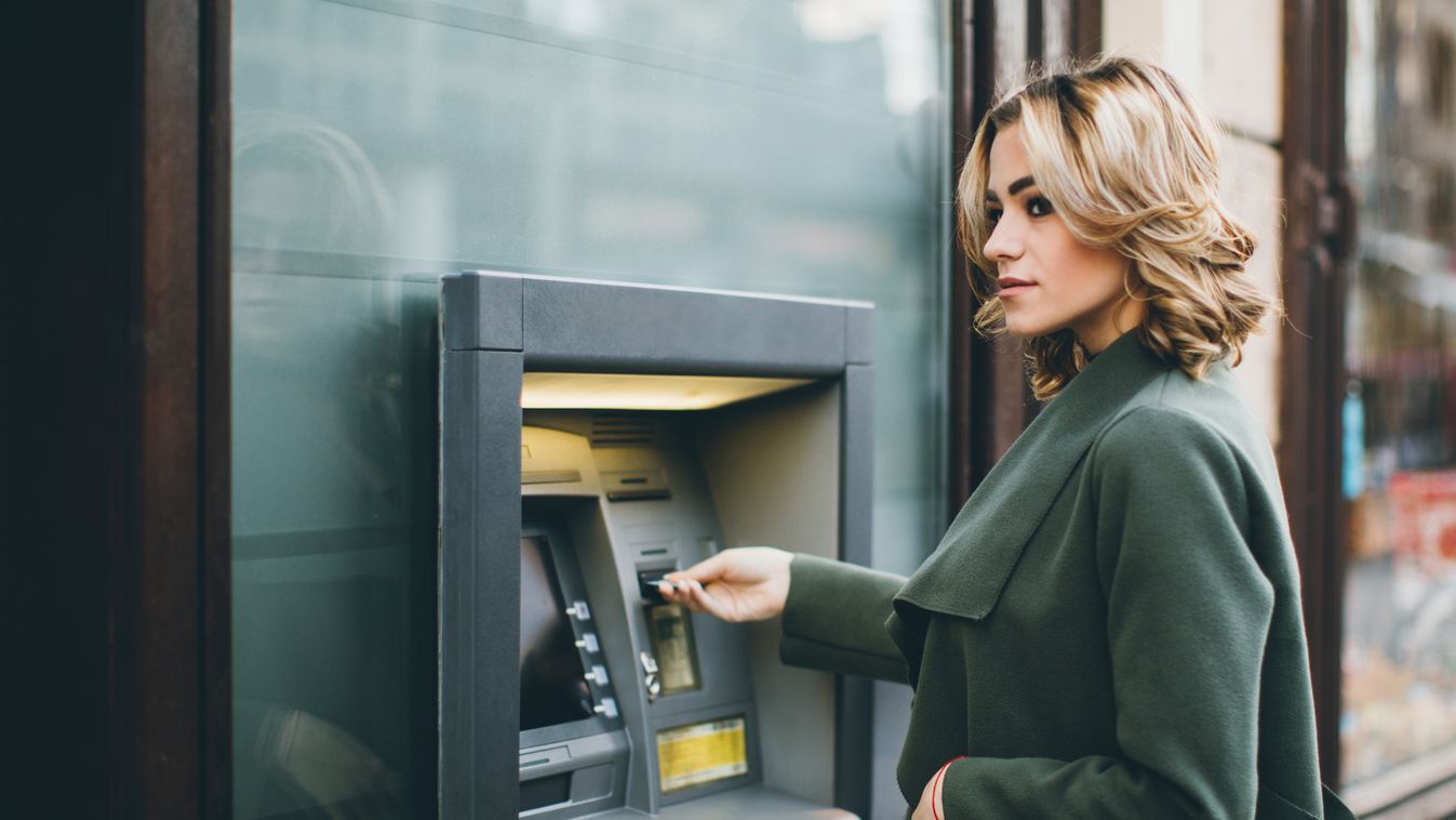 Young woman using ATM Consumerism One Woman Only Young Women Banking Coding City Life Bank Account Coin Bank Coin Paper Currency Currency Customer Caucasian Ethnicity One Person Wealth Balance Business Finance Technology Lifestyles Urban Scene Outdoors Cl