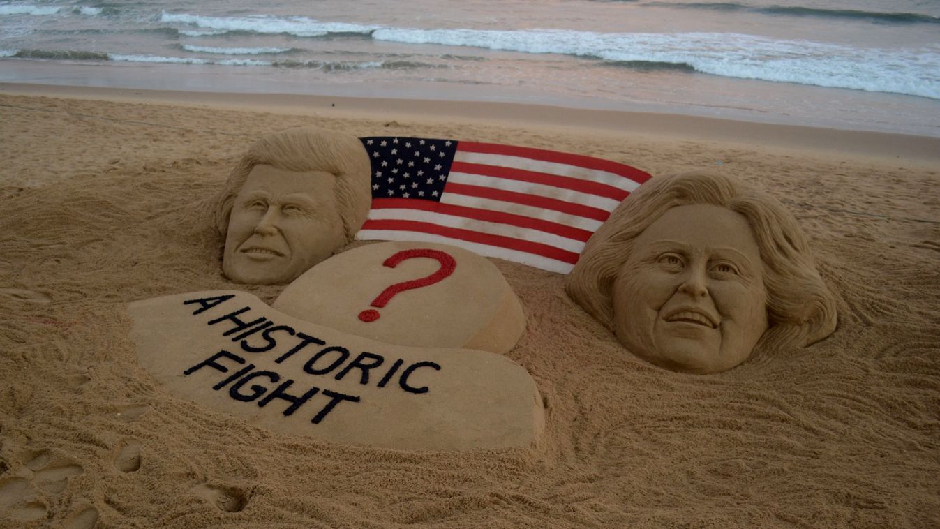 Sand sculpture  USA Presidential Election india usa POLITICS SAND SCULPTURE USA Presidential Election trump clinton VOTE SAND 
