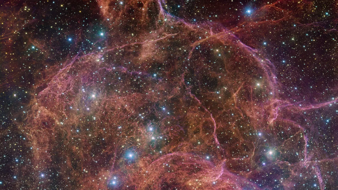 Vela Supernova Remnant This image shows a spectacular view of the orange and pink clouds that make up what remains after the explosive death of a massive star — the Vela supernova remnant. This detailed image consists of 554 million pixels, and is a combi