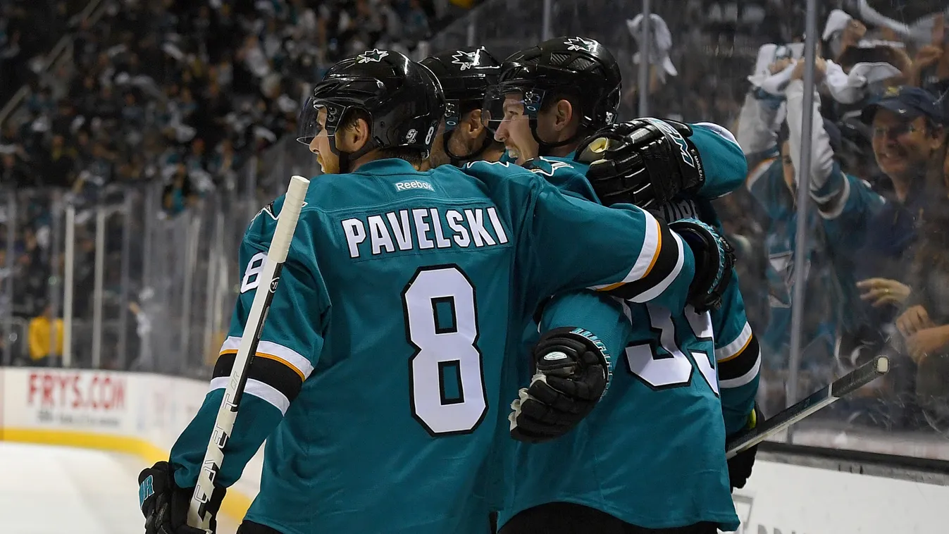 SAN JOSE, CA - MAY 01: Logan Couture #39 of the San Jose Sharks is congratulated by Joe Pavelski #8 after Couture scored a goal against the Nashville Predators in Game Two of the Western Conference Second Round during the 2016 NHL Stanley Cup Playoffs. at