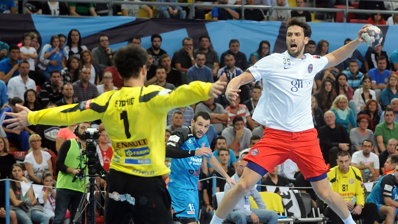 HORIZONTAL Paris Saint-Germain's Marko Kopljar (R) vies with Metalurg's goalkeeper Darko Stanic during their group A Champions League EHF Final Four match between PSG vs Metalurg in Skopje, on September 28, 2014.AFP PHOTO / ROBERT ATANASOVSKI 