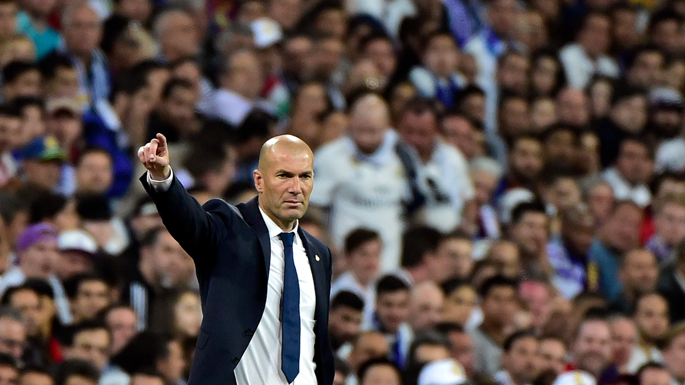 fbl Horizontal Real Madrid's French coach Zinedine Zidane gestures during the Spanish league football match Real Madrid CF vs FC Barcelona at the Santiago Bernabeu stadium in Madrid on April 23, 2017. / AFP PHOTO / GERARD JULIEN 