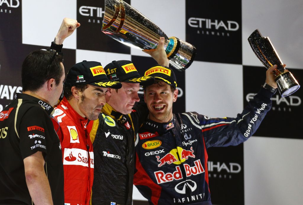 Forma-1, Éric Boullier, Fernando Alonso, Kimi Räikkönen, Sebastian Vettel, Abu-dzabi Nagydíj 2012, dobogó 