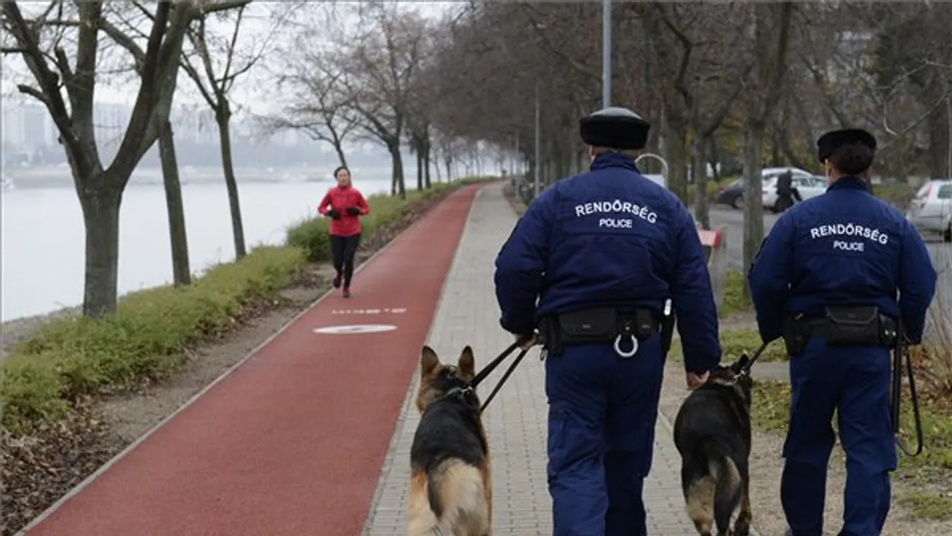 Kutyás rendőrök vigyáznak a futókra 2015. december 7-én a Margitszigeten, ahol megkezdték a kamerarendszer és segélyhívó oszlopok kiépítését. A futókör mentén eddig 36 kamerát és 6 segélyhívó oszlopot telepítettek. 