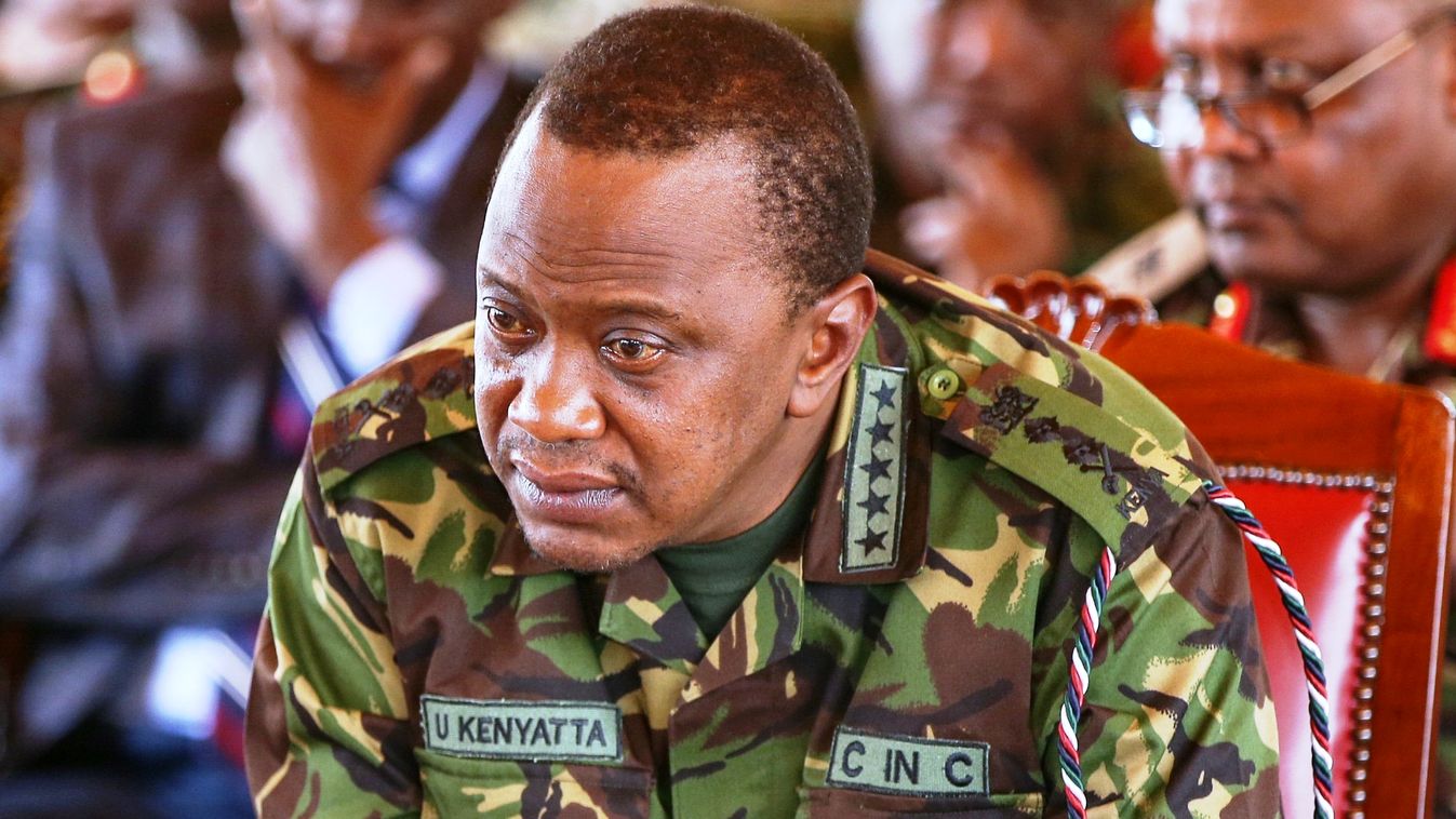Kenyan President Uhuru Kenyatta attends an military exercise briefing during the Distinguished Visitors Day at the Validation Exercise of Kenya's Pledged Forces to the East African Standby Force at the training  camp in Archer's Post, Isiolo County, on Se