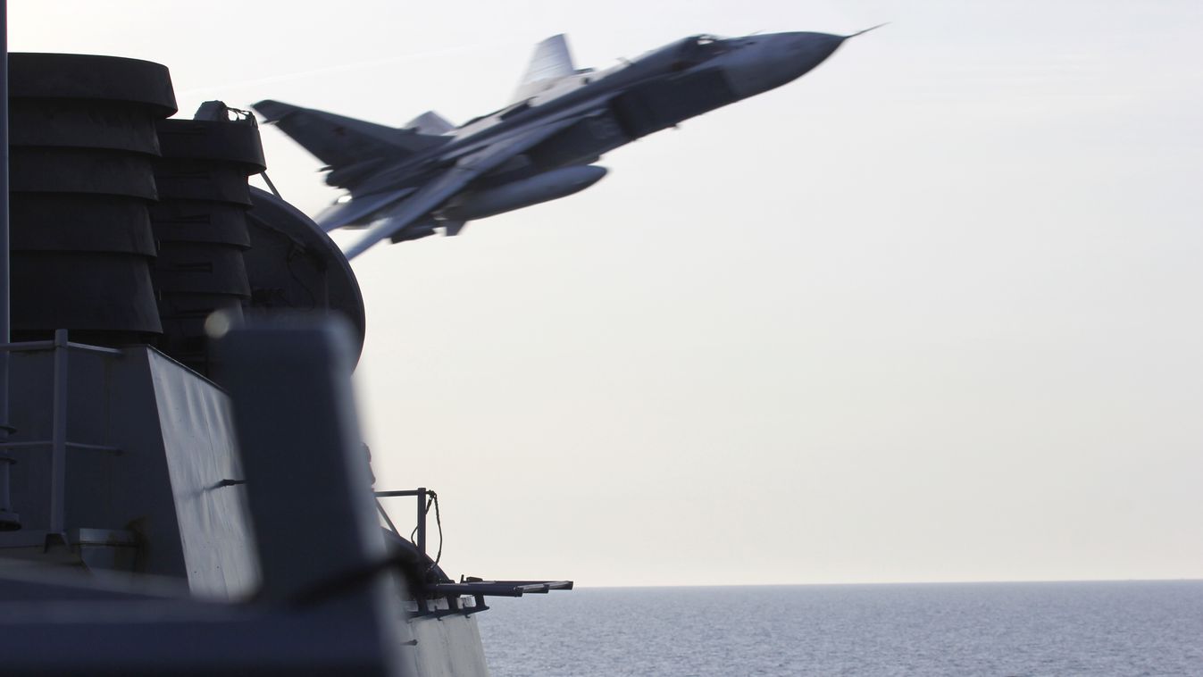 Russian jets conducted 'aggressive' passes of US warship: official politics Horizontal 