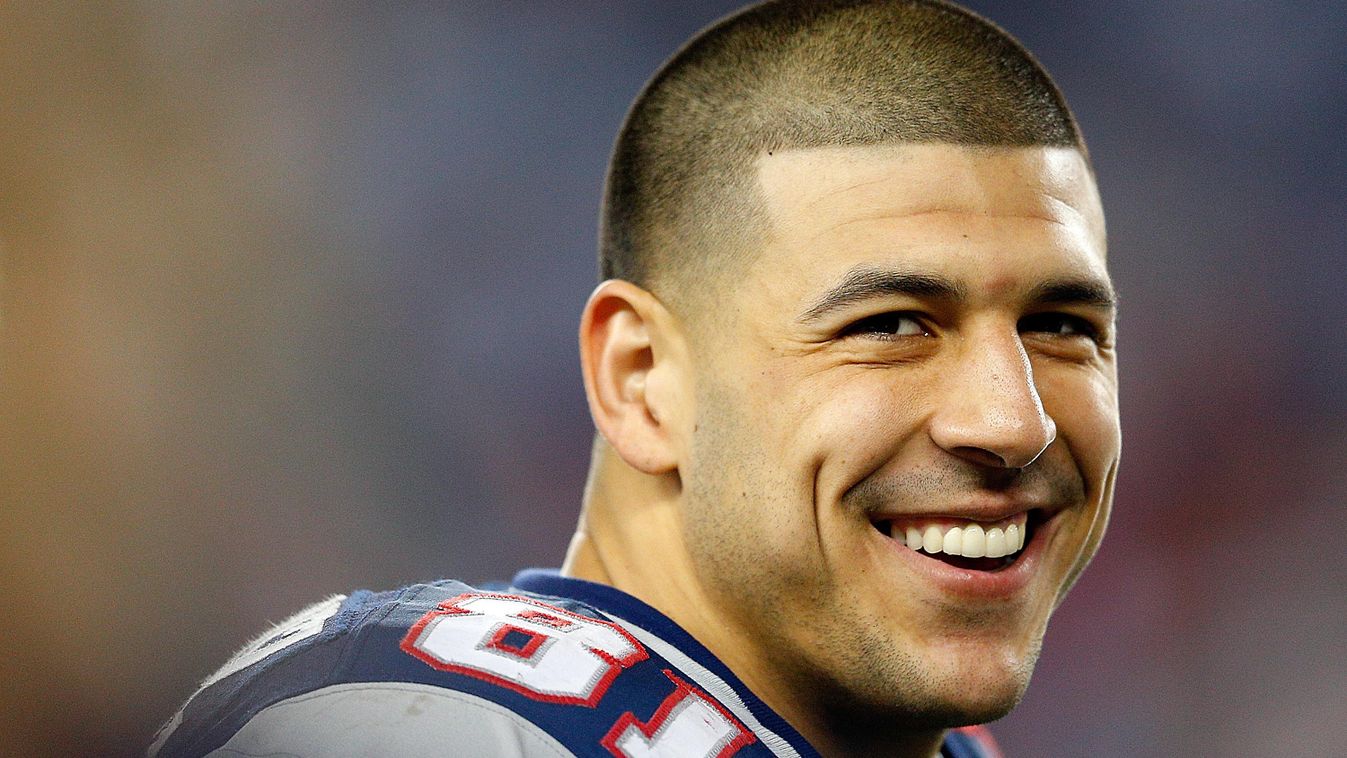 FOXBORO, MA - DECEMBER 10: Aaron Hernandez #81 of the New England Patriots smiles from the sidelines in the fourth quarter during a game against the Houston Texans at Gillette Stadium on December 10, 2012 in Foxboro, Massachusetts.   Jim Rogash/Getty Imag