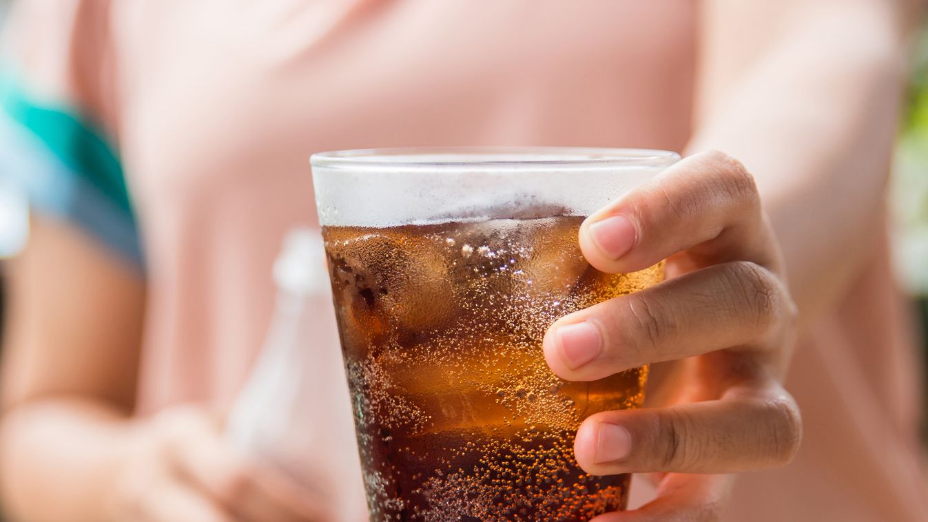 glass of cola with ice. cola drink drinks iced pop wet cold carbonation table soft two caffeine liquid sweet brown beverage thirsty wood tasty carbonated fizzy cool refreshment fresh fizz water thirst sparkling soda frozen food tonic bubbles glass sugary 