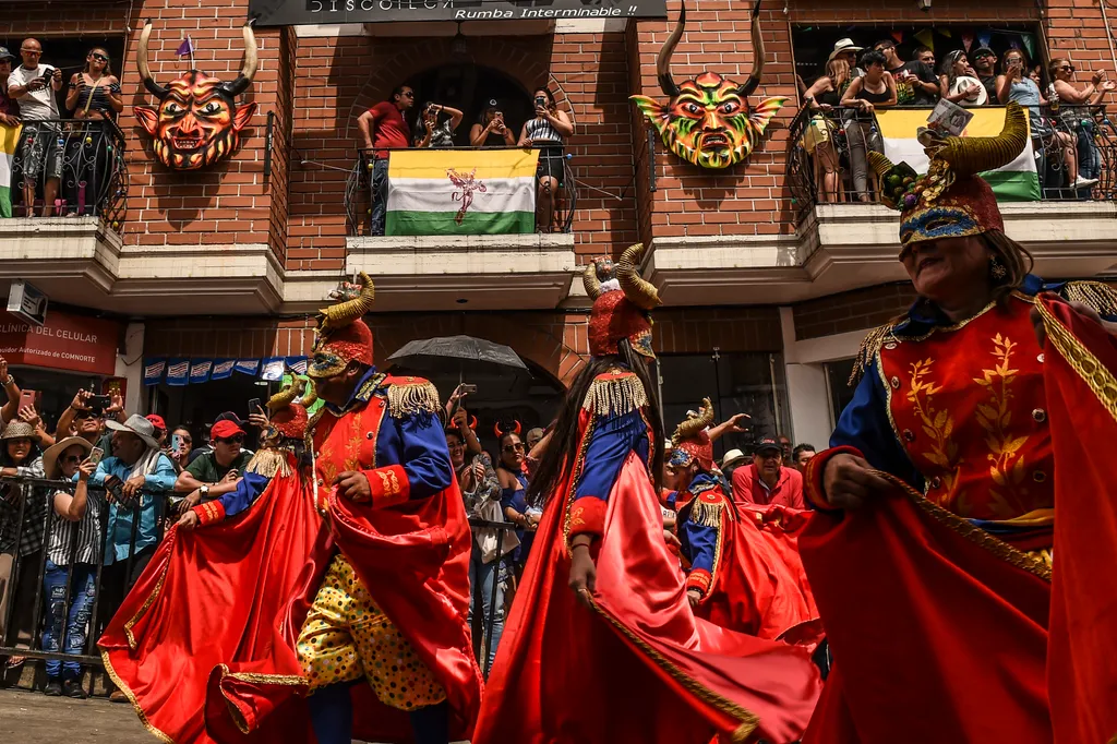 Revellers perform during the "Cuadrillas" parade during the Devils Carnival, in Riosucio, Caldas Department, Colombia, on January 6, 2019. - The Devil's Carnival, which takes place every two years, has its origins in the 19th century when the town of Rios