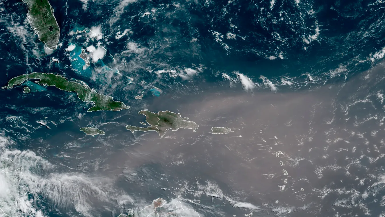 porfelhő This satellite photo provided by the National Oceanic and Atmospheric Administration, NOAA, shows a could of dust coming from the Sahara desert arriving to the Caribbean Monday, June 22, 2020. The massive 