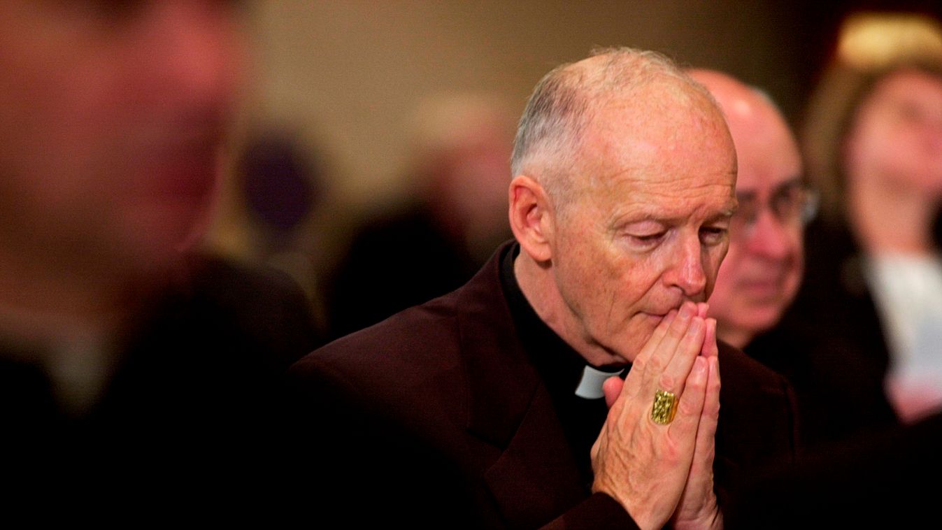 Horizontal (FILES) In this file photo taken on November 11, 2002, Archbishop of Washington Cardinal Theodore McCarrick prays during a prayer for deceased bishops at the start of the morning session of the US Conference of Catholic Bishops being held in Wa