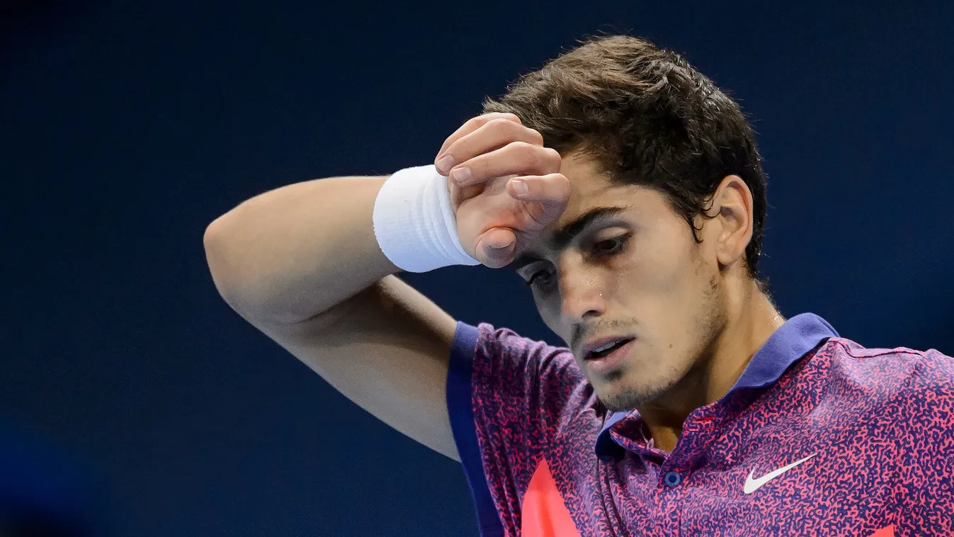 - Pierre-Hugues Herbert of France reacts during his match against Rafael Nadal of Spain during the Swiss Indoors ATP 500 tennis tournament on October 22, 2014 in Basel. AFP PHOTO / FABRICE COFFRINI 