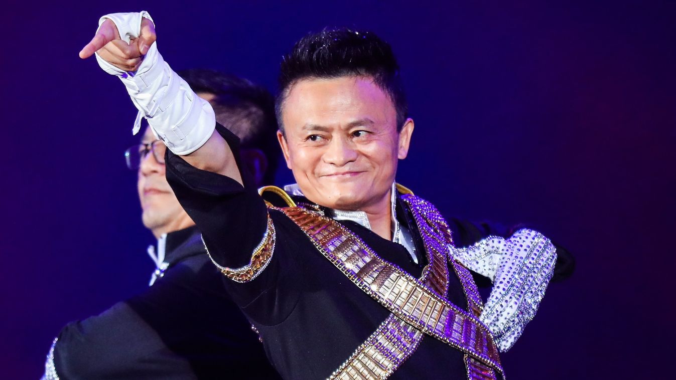 Horizontal (FILES) This file photo taken on September 8, 2017 shows Jack Ma, chairman of Alibaba group, dancing to a medley of Michael Jackson songs during the Alibaba Annual Party at the Huanglong sports center in Hangzhou in China's eastern Zhejiang pro