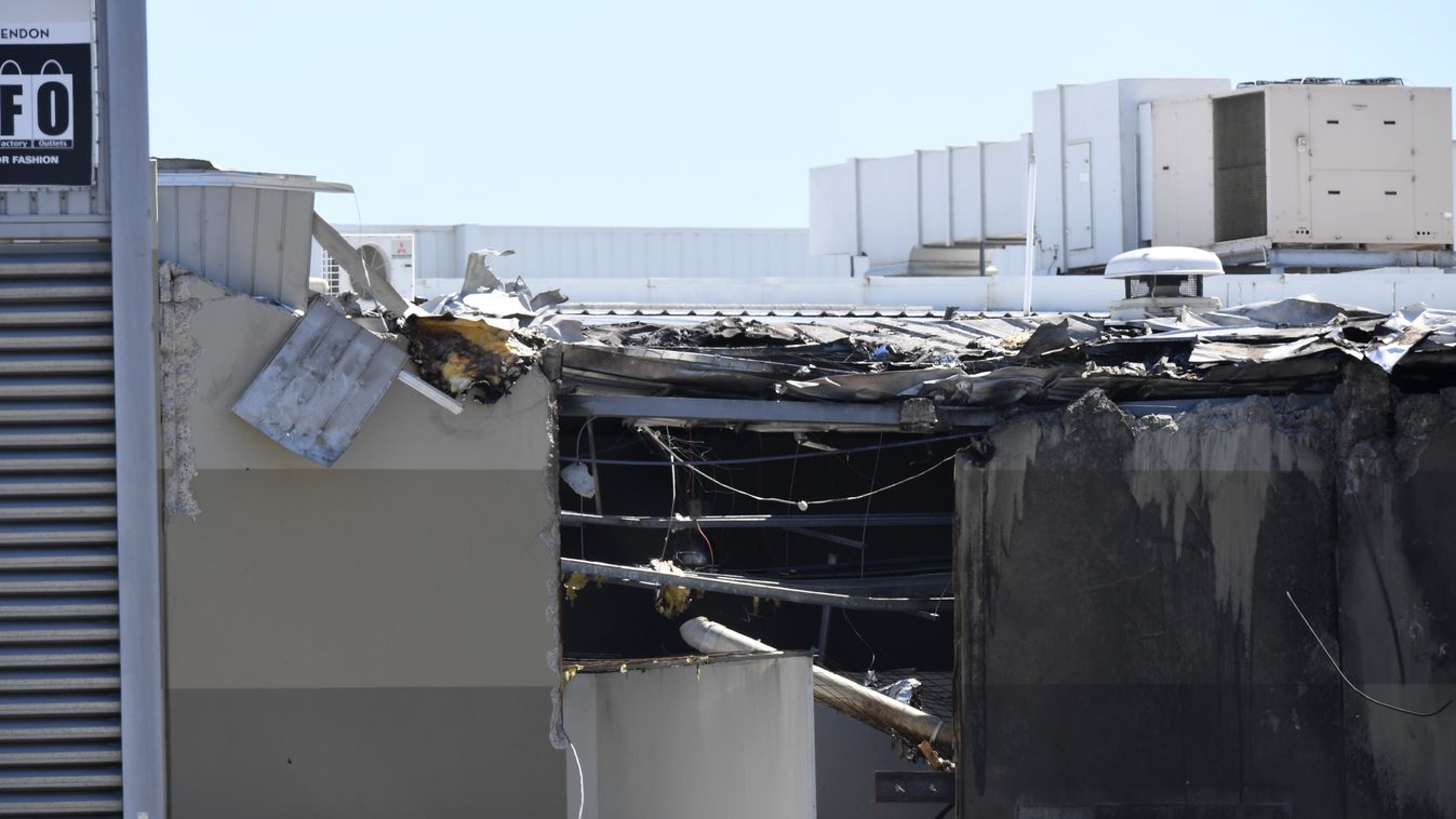 accident Horizontal A general view shows damage to the building after a Beechcraft plane crashed into a shopping centre just after tack-off from the Essendon airport in Melbourne on February 21, 2017.
A light aircraft carrying five people crashed on Febru