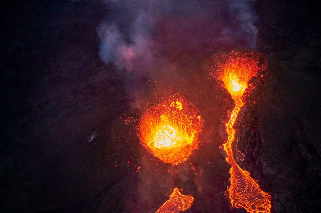 Horizontal NATURAL DISASTERS VOLCANO VOLCANO ERUPTION LAVA FLOW NIGHT Lava flows from a fissure along the Fagradalsfjall on the Reykjanes Peninsula in Iceland on ,April 6, 2021. - The volcanic eruption, which has been ongoing for more than two weeks in Ic